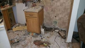 Water Damage Fire Damage Kitchen Area With Restoration In Progress